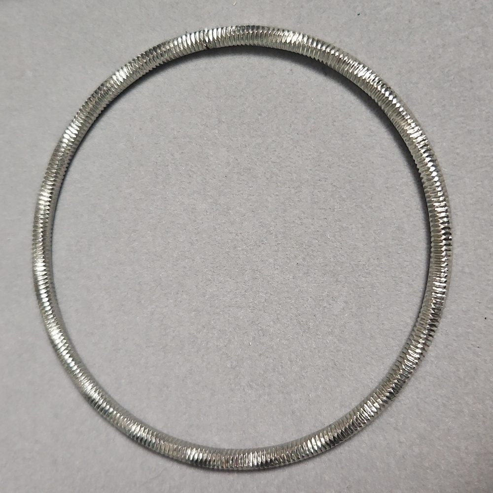 Elegant Silver-Tone Bangle Bracelet